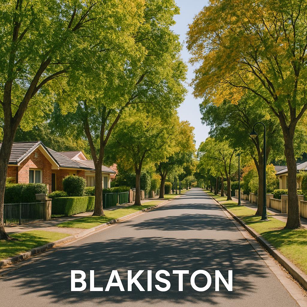 Leafy street view in Blakiston, showcasing a tranquil neighborhood.