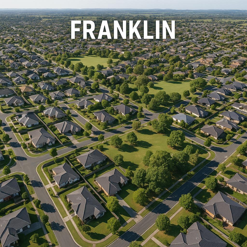 Aerial view of Franklin, ACT with homes and green parks